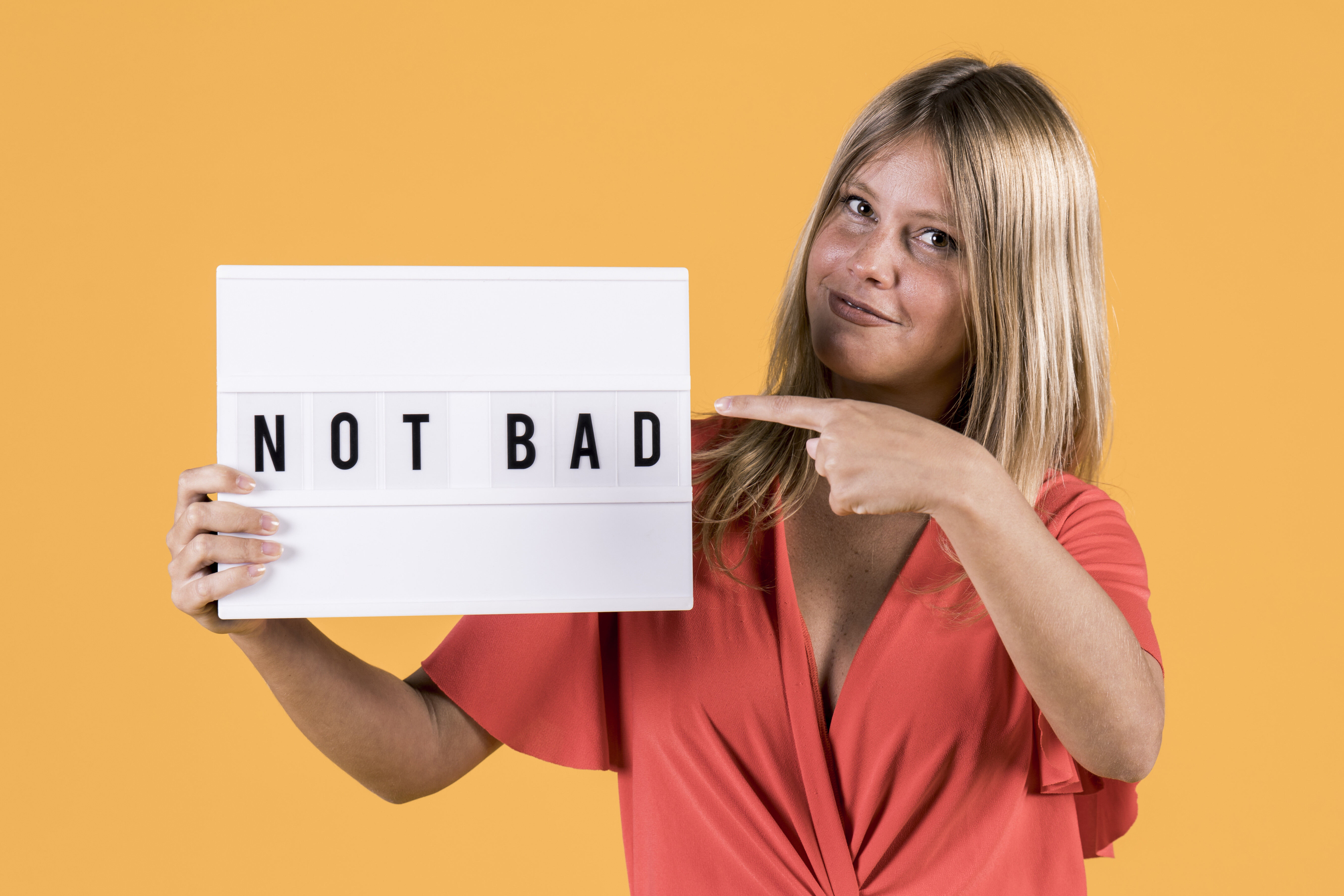 deaf young woman pointing light box text bad